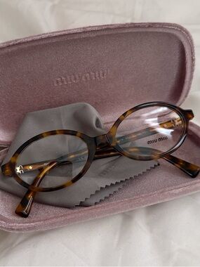 Miu Miu Tortoiseshell Oval Acetate Glasses